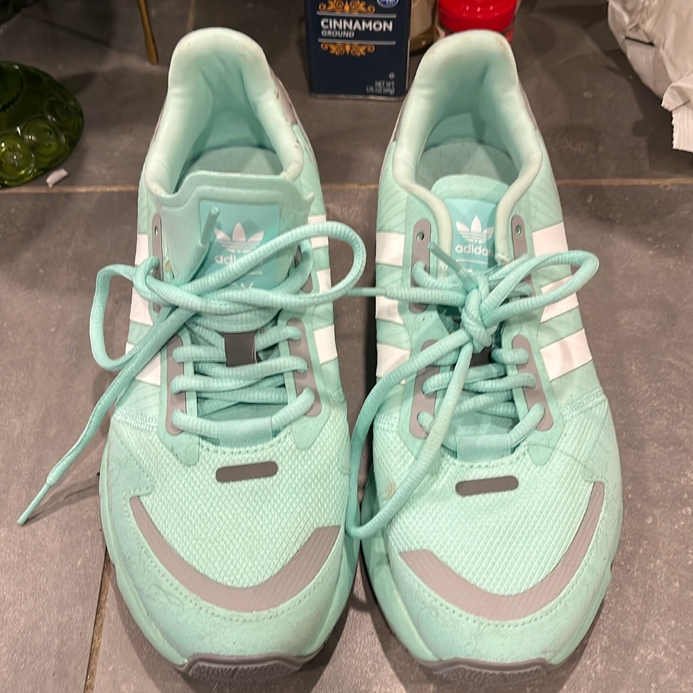 Woman’s gently used adidas shoes (worn once) light blue/green size 7.5
